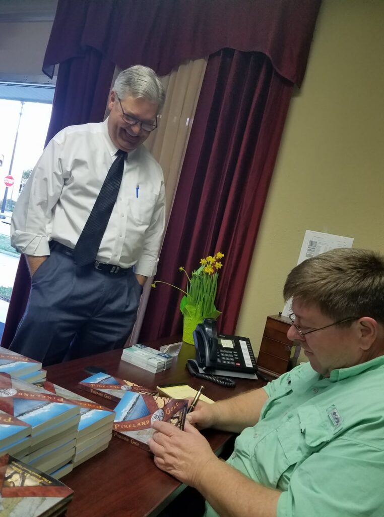 Even the Mayor loves John’s books!  John with former Mayor of Fort Myers, Randy Henderson.